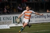Morgan Thompson clears the ball