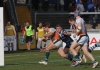 Andrew Henderson wriggles through for a try