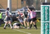 The referee signals a try